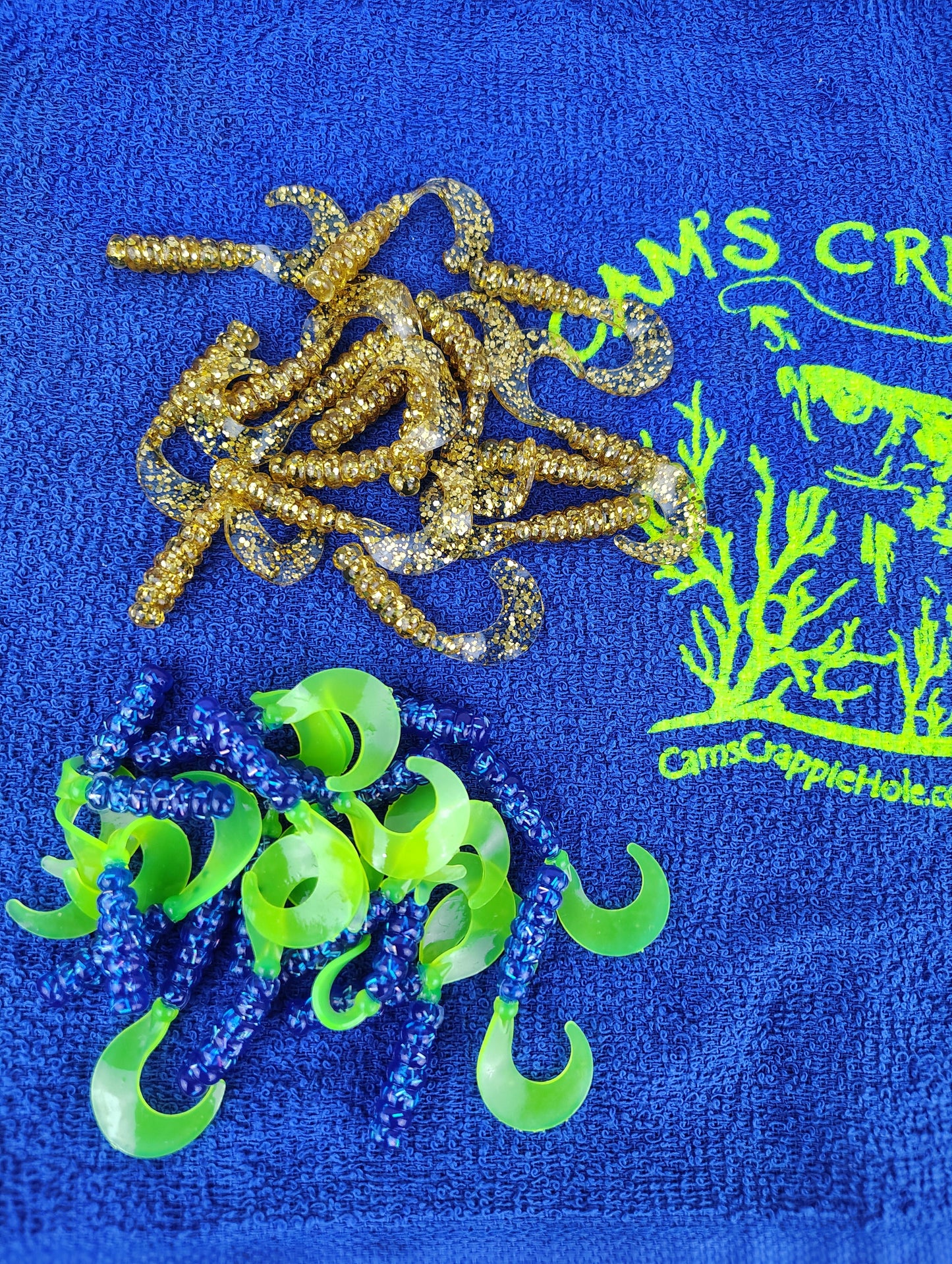 Cam's 2"(HOLOGRAM FLAKE) MR OCTOBER GOLD/FIREBALL BLUE 100pc (SPLIT SET) Curly Tail Crappie Soft Jigs [A Cam's Exclusive