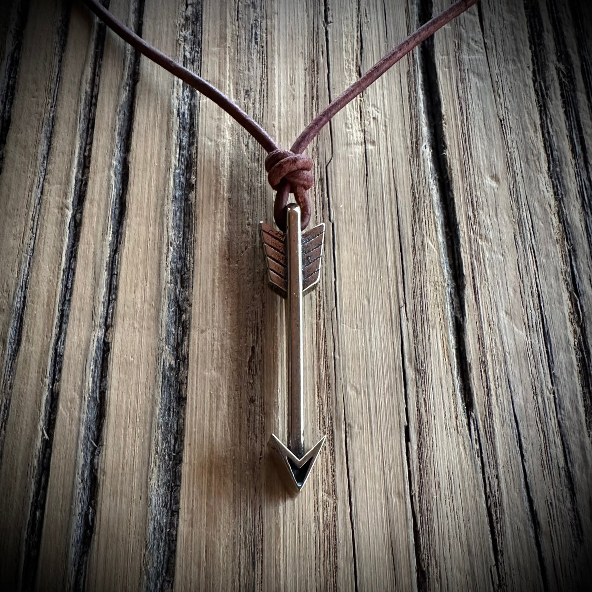 STRENGTH Arrow of Courage Necklace - Solid Bronze on Leather Cord