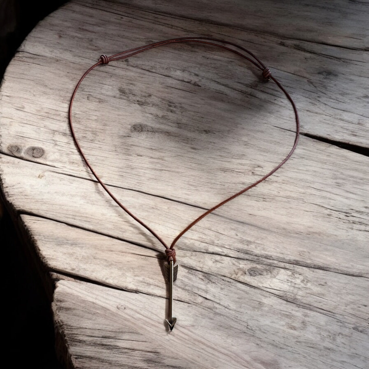 STRENGTH Arrow of Courage Necklace - Solid Bronze on Leather Cord