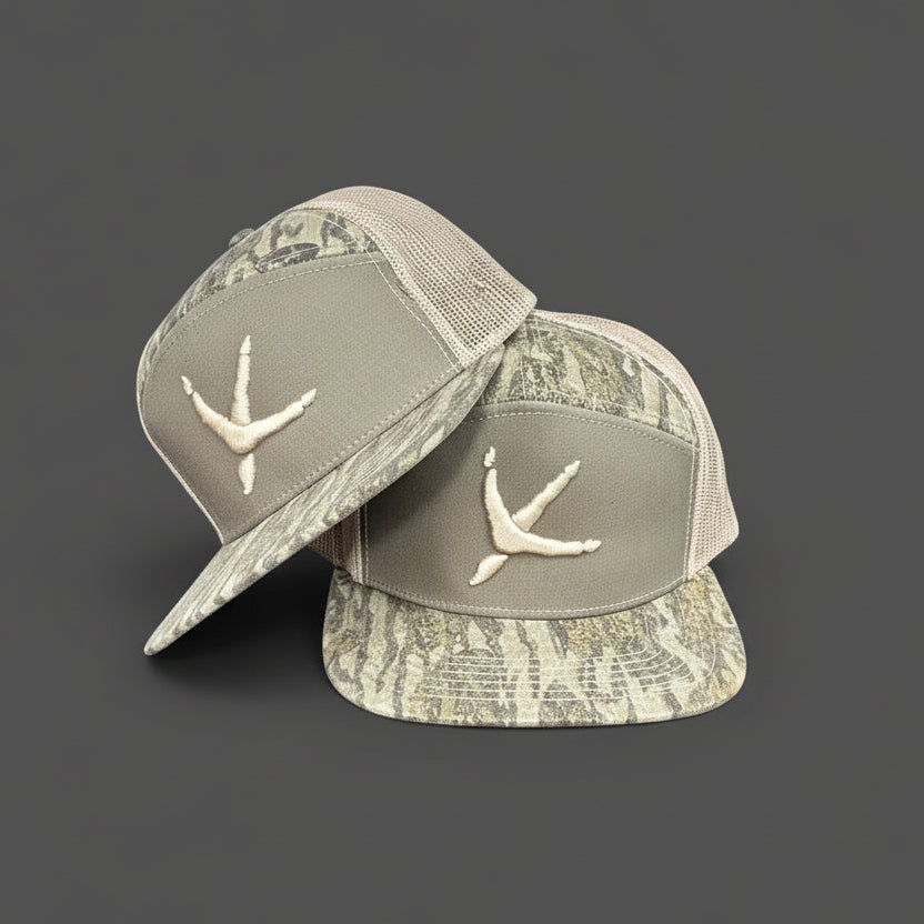Mossy Oak New Bottomland & Sage Turkey Tracks Logo