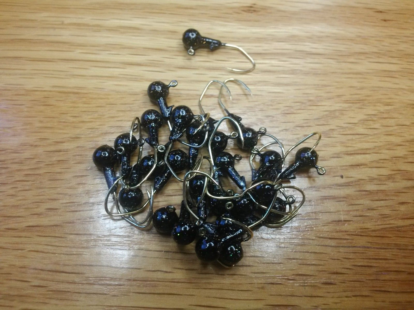35 pk. 1/16 oz. Cam's Black Painted Jigs with Collar and #4 Gold "NASTY BEND HOOKS"