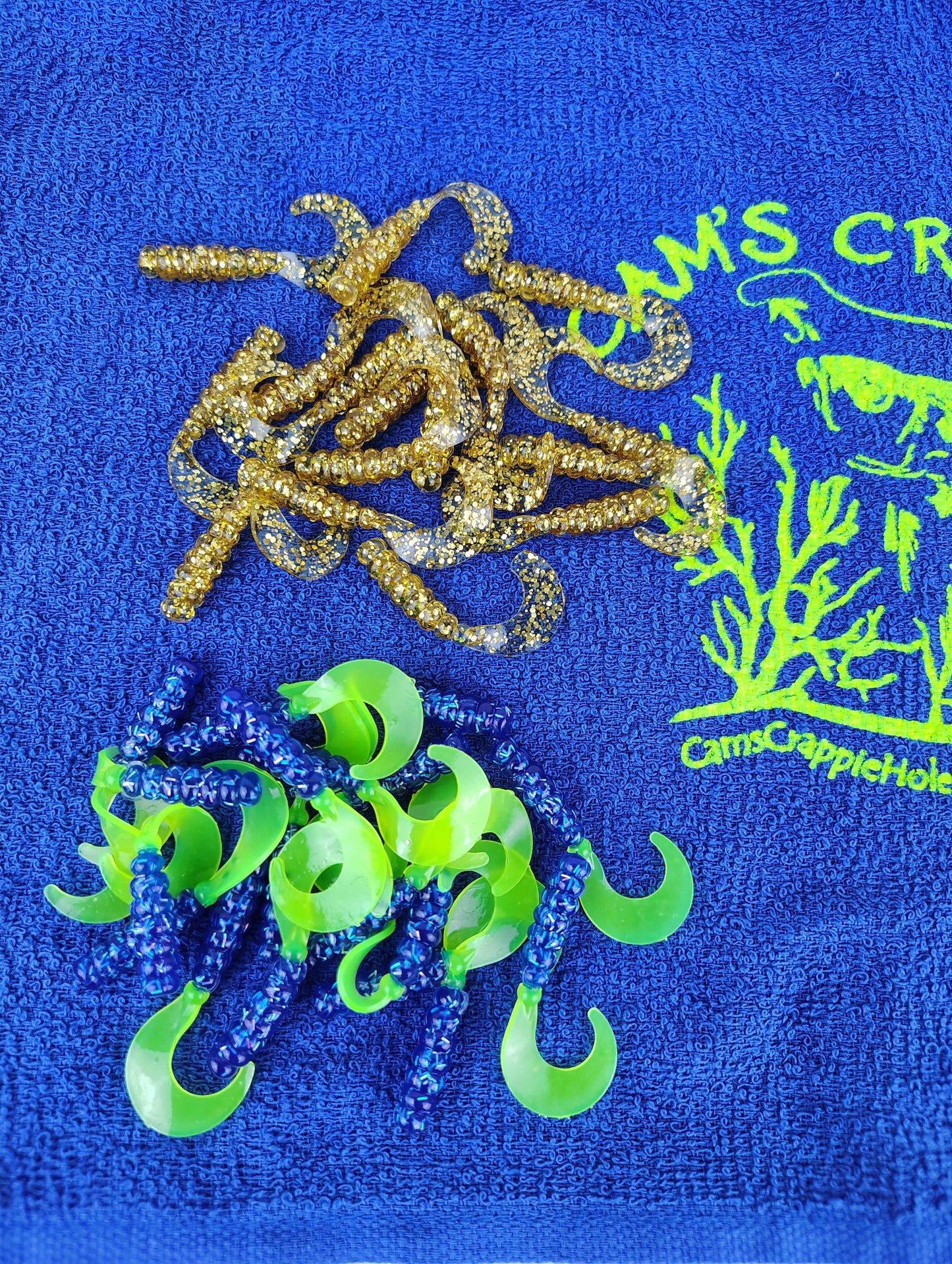 Cam's 2"(HOLOGRAM FLAKE) MR OCTOBER GOLD/FIREBALL BLUE 100pc (SPLIT SET) Curly Tail Crappie Soft Jigs [A Cam's Exclusive