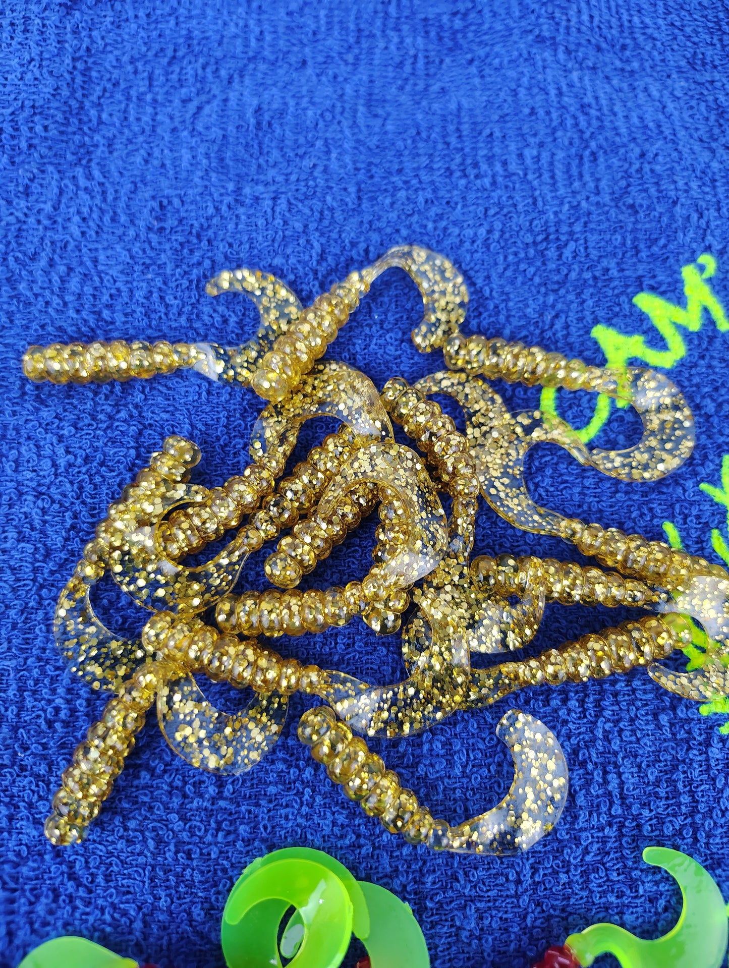 Cam's 2"(HOLOGRAM FLAKE) MR OCTOBER GOLD/FIREBALL RED 100pc (SPLIT SET) Curly Tail Crappie Soft Jigs [A Cam's Exclusive