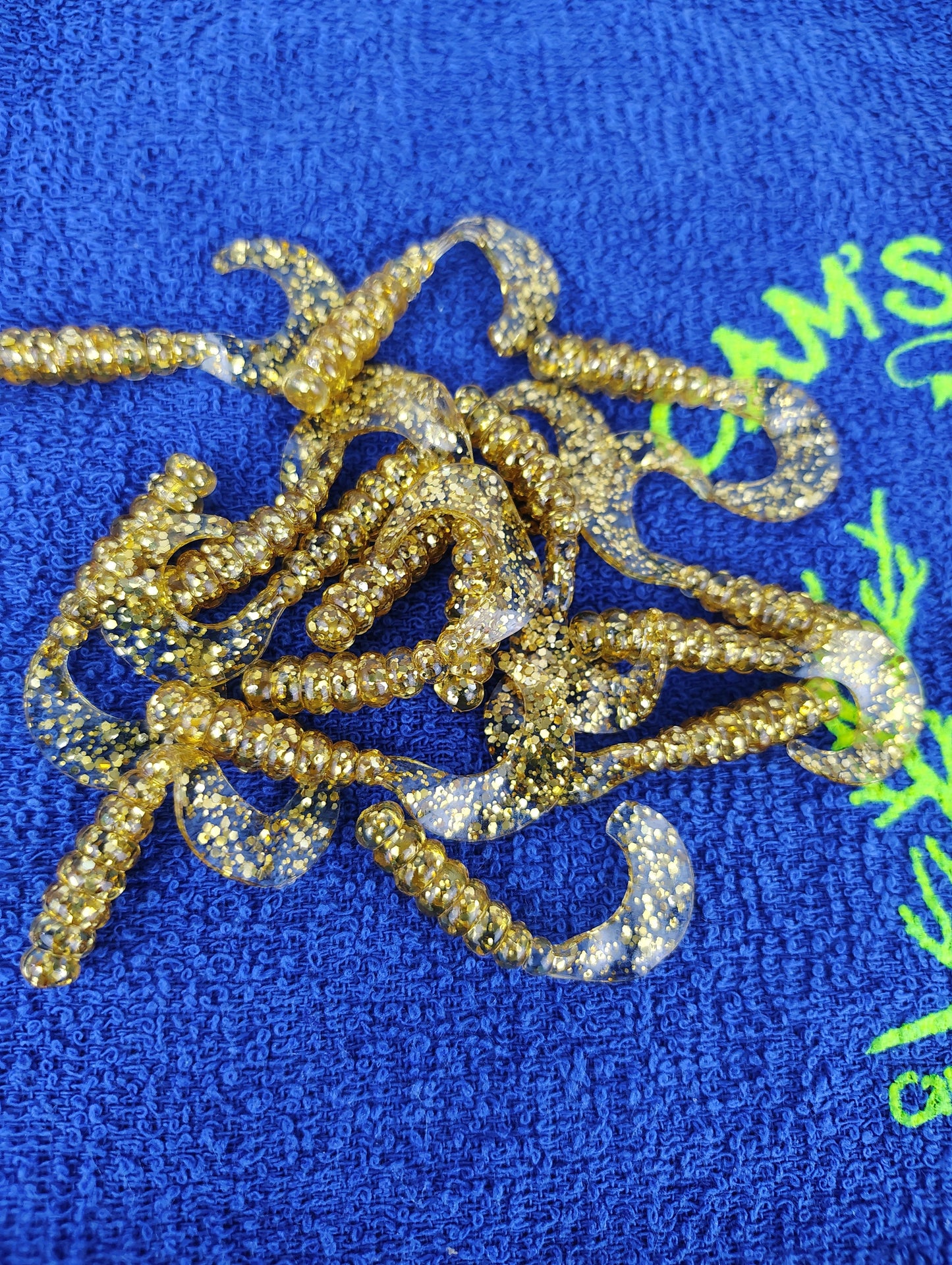 Cam's 2"(HOLOGRAM FLAKE) MR OCTOBER GOLD/FIREBALL RED 100pc (SPLIT SET) Curly Tail Crappie Soft Jigs [A Cam's Exclusive
