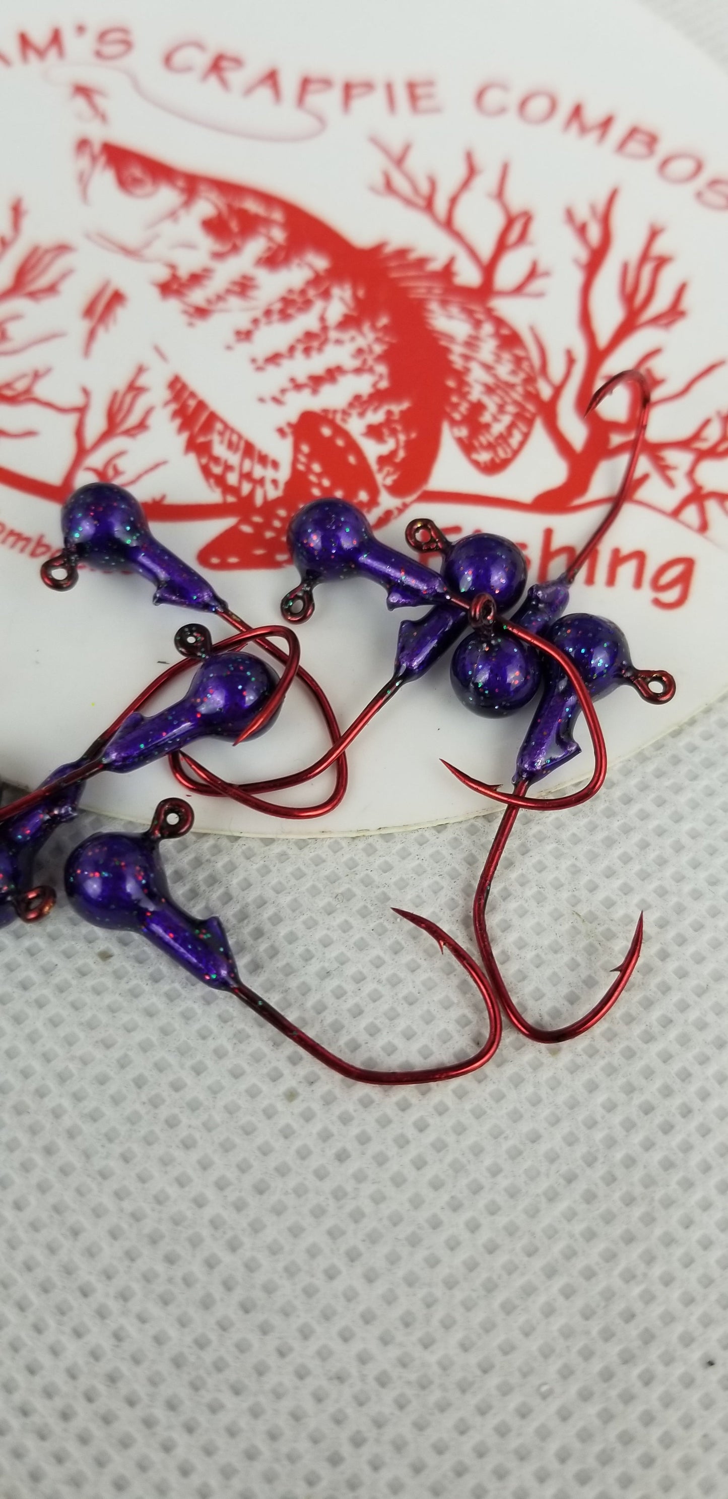 35 pk. 1/32 oz. Cam's "PURPLE PASSION" Painted jigs with Collar and #2 Red Chrome "NASTY BEND HOOK"