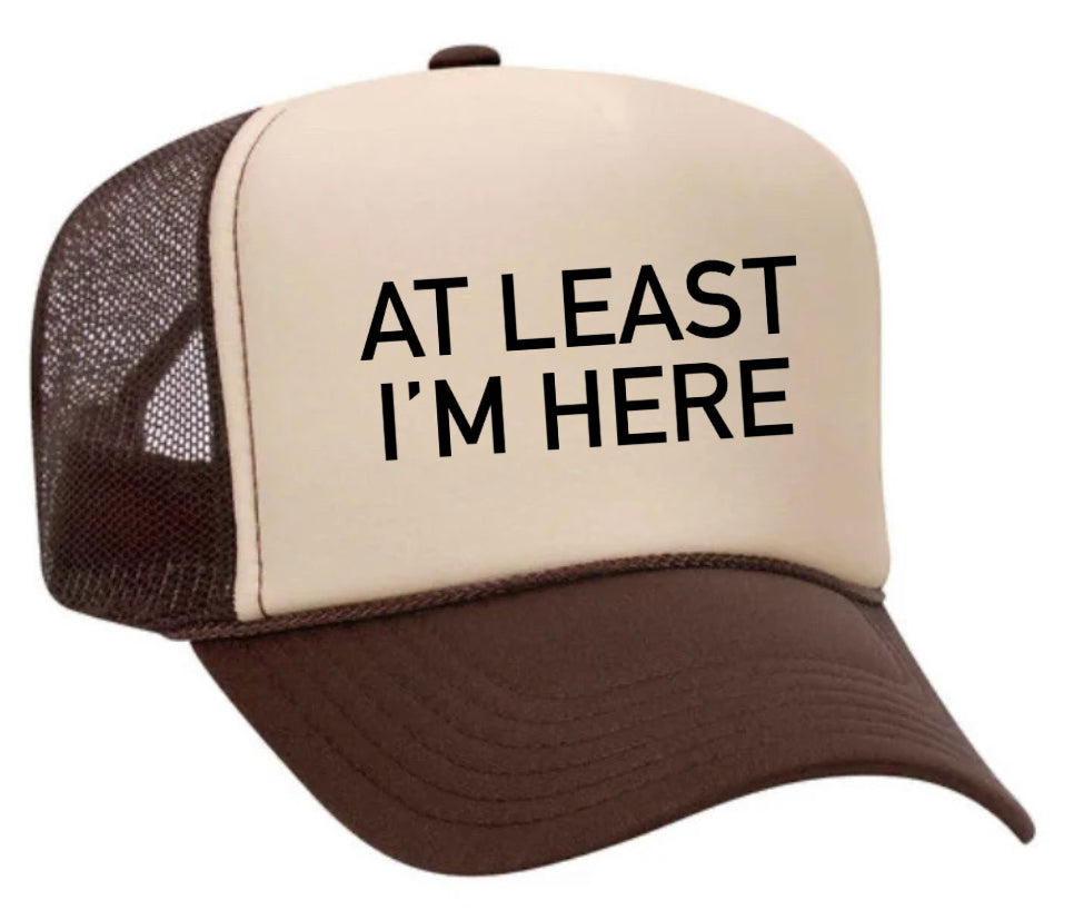 At Least I'm Here Trucker Hat
