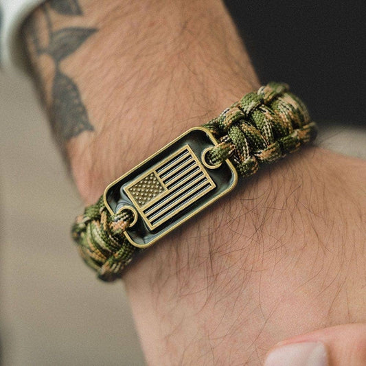 The Hero Company-Camo Paracord Bronze Flag Bracelet- Helps Pair Veterans With A Companion Dog