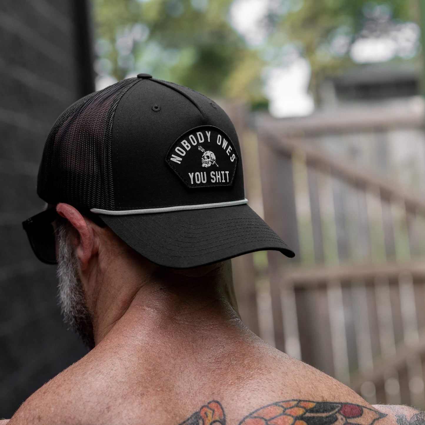 Nobody Owes You Shit Skull Arched Patch Rope Snapback