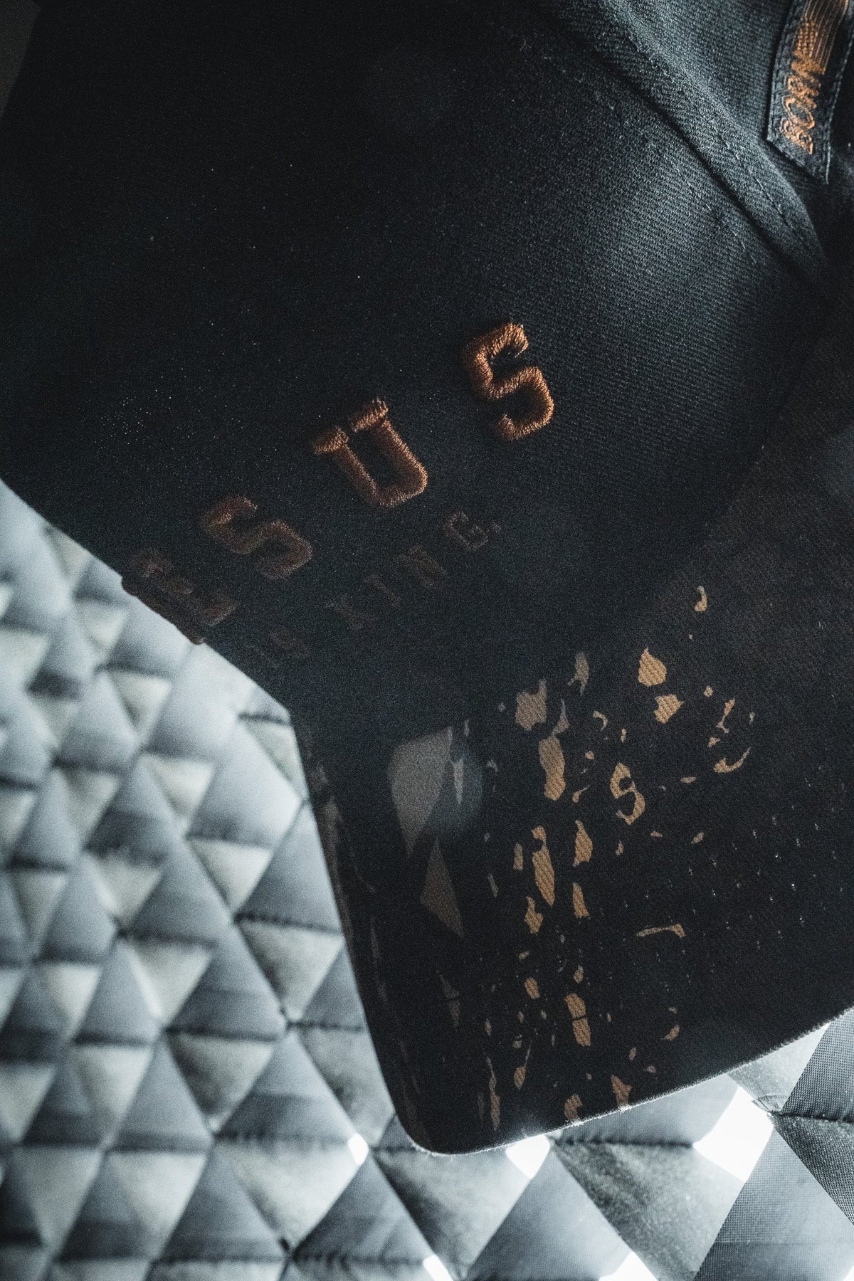 Jesus is King - Black and Darkwood Camo Snapback
