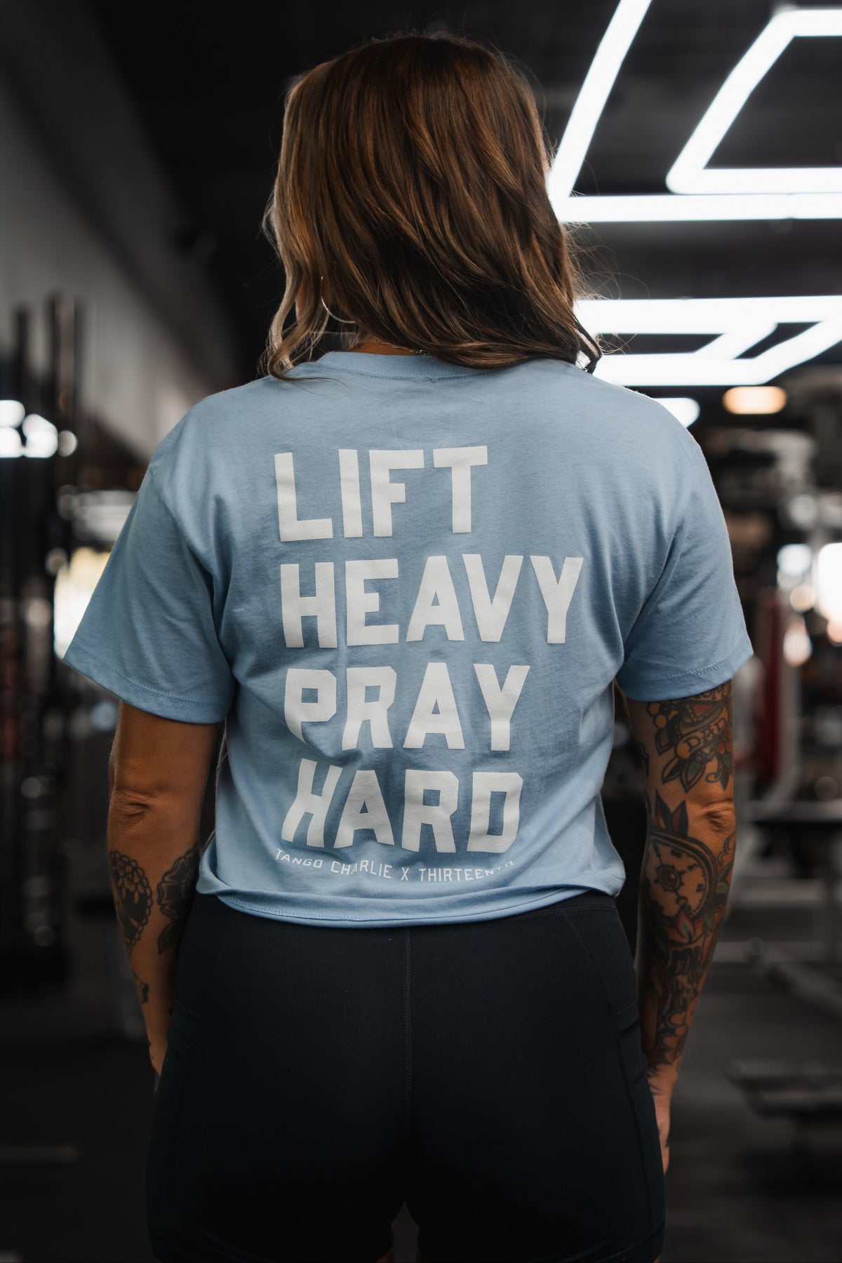 Lift Heavy. Pray Hard. - Baby Blue Women's Crop Tee