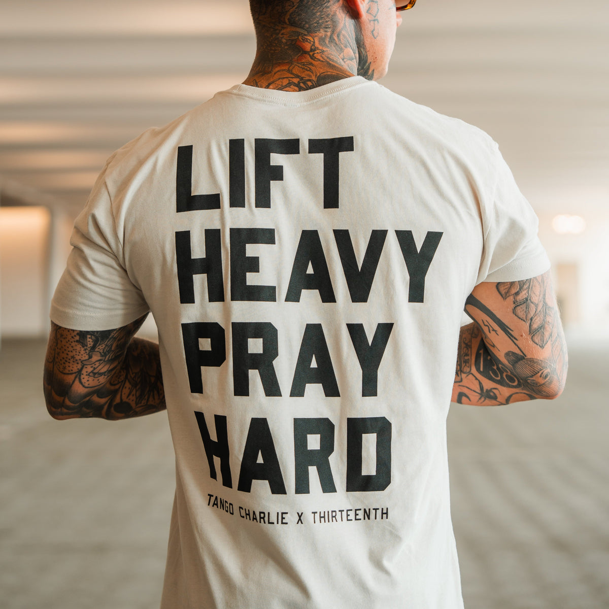 Lift Heavy. Pray Hard. - Tee