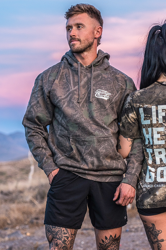 Lift Heavy. Trust God. - Premium Darkwood Camo Hoodie