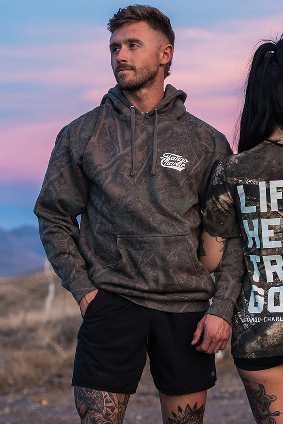 Lift Heavy. Trust God. - Premium Darkwood Camo Hoodie