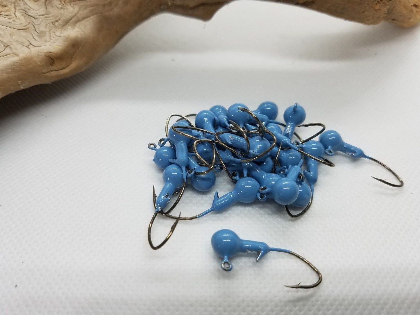 35 pk. 1/16 oz. Cam's "Sky Blue" Painted Jigs with Collar and #2 Black Nickel "NASTY BEND HOOKS"